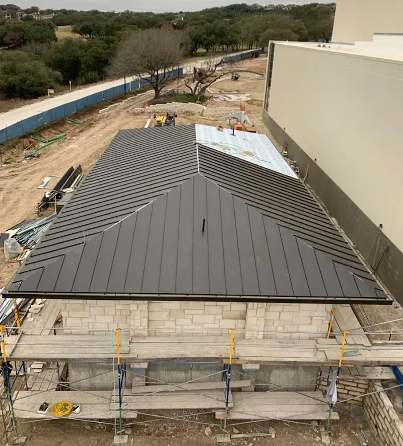 Metal roof new construction with scaffolding in Rockland